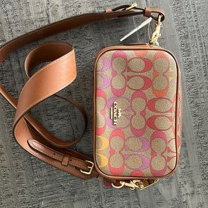 Brand new with tag.  Coach purse.  Excellent condition